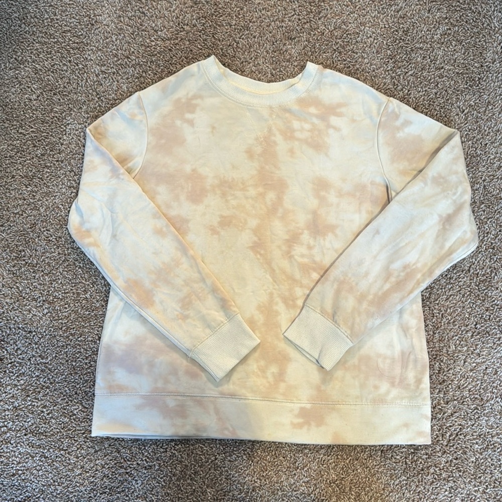 Medium sized, light pink and crème crewneck.